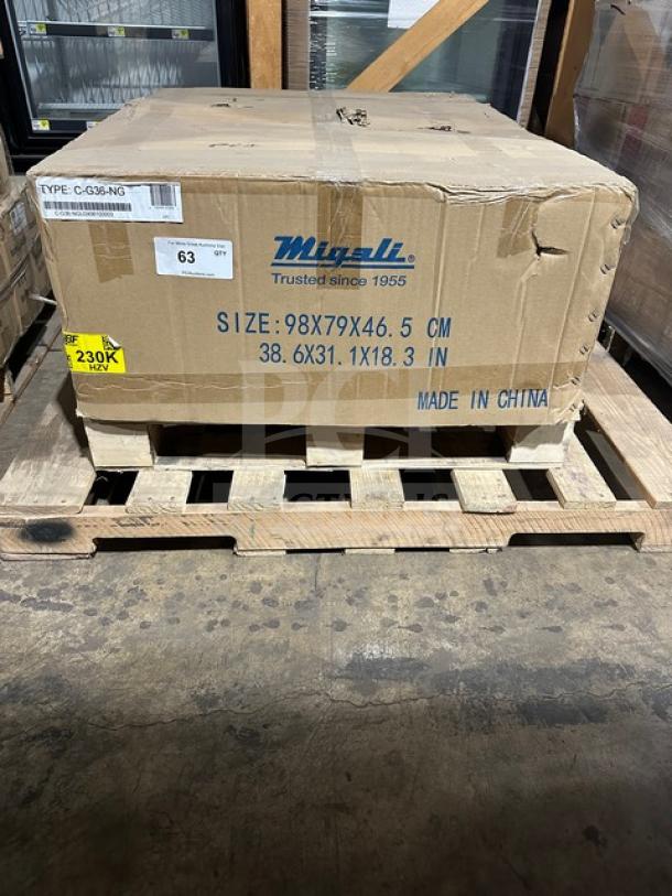 Cardboard box labeled "Migali," size 98x79x46.5 cm, marked "Trusted since 1955" and "Made in China," on wooden pallet.