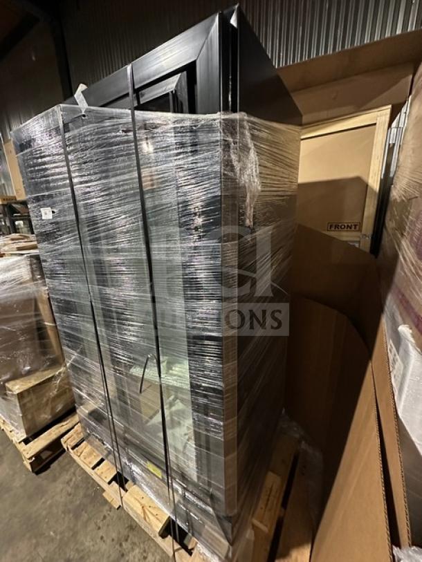 Beverage Air commercial refrigerator, wrapped in plastic, black frame, double doors, on pallet, new condition.