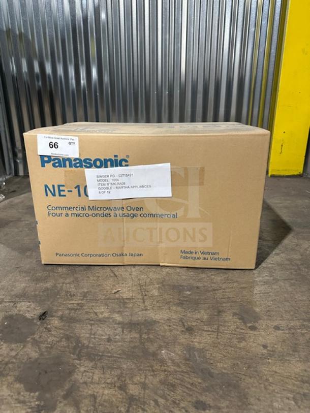New Panasonic Pro Microwave Model NE1054 in box. Features digital touch pad, 115V, 1 Phase. Made in Vietnam. Box shows label details.