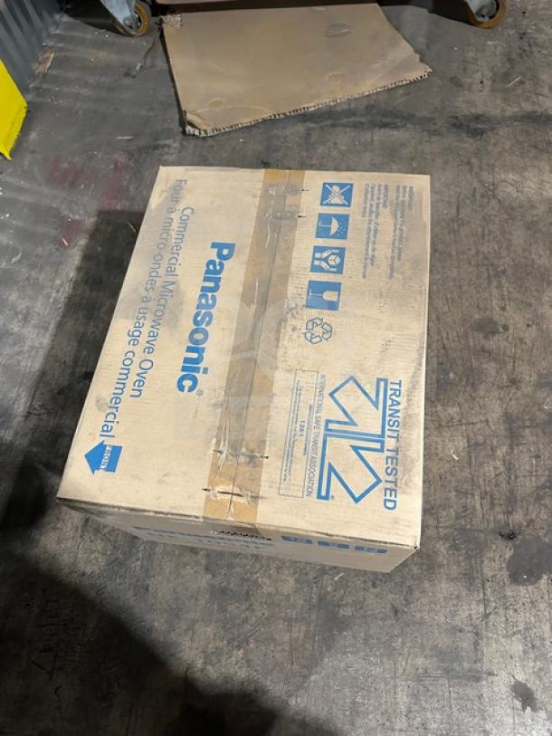 New in box Panasonic Pro Microwave, Model NE1054, with digital touch pad, 115V 1 phase, cardboard packaging.