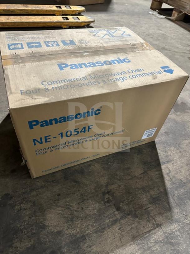 New Panasonic Pro Microwave NE1054 in box, features digital touch pad, 115V 1 Phase, commercial use indicated on packaging.