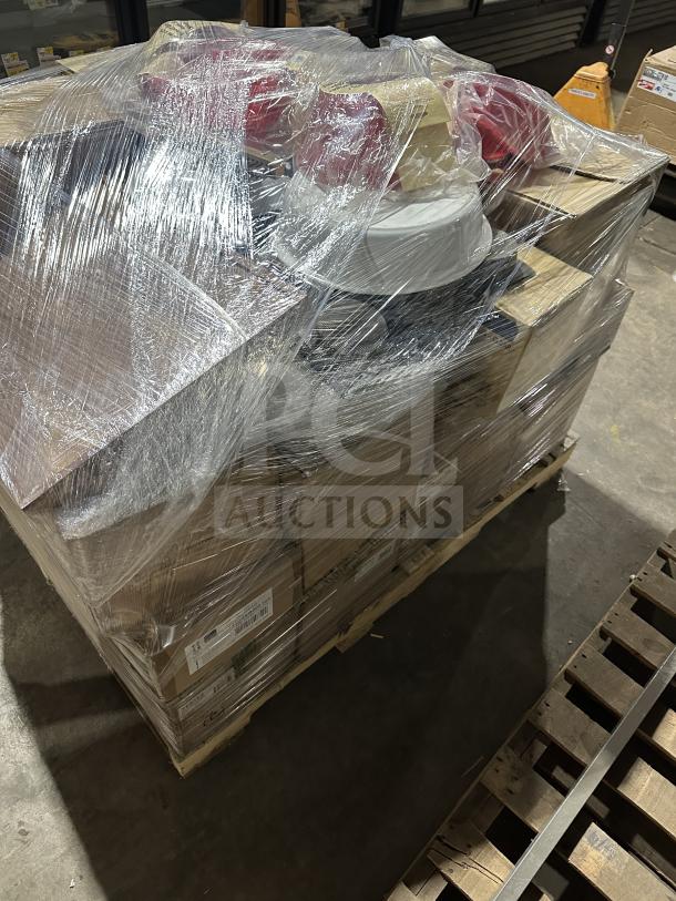 Pallet with brand new mixed boxes, including Mikasa Lemons china, Rish mugs, Vertex plates, and more, wrapped in plastic.