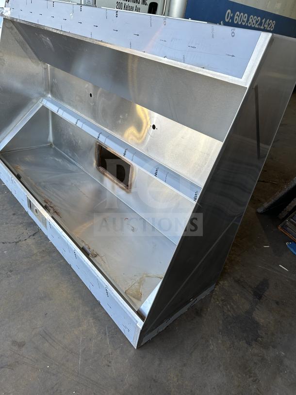 NEW Captive Air 72" stainless steel exhaust hood, pristine condition, visible protective film, industrial-grade kitchen equipment.