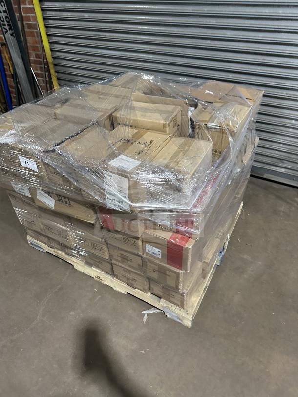 Pallet of assorted boxes including Santol Miror spoons, Londrink glasses, bamboo chopsticks, table knives, and more, wrapped in plastic.