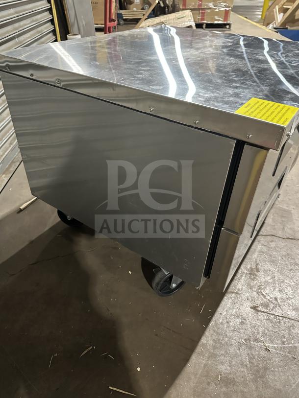 New Atosa stainless steel chef base refrigerator, model MGF8448GR, on casters. Electric-powered, 115V, 1 phase.