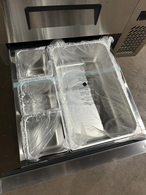 Brand new Atosa chef base refrigerator, model MGF8448GR, stainless steel, electric-powered, 115V, on casters.