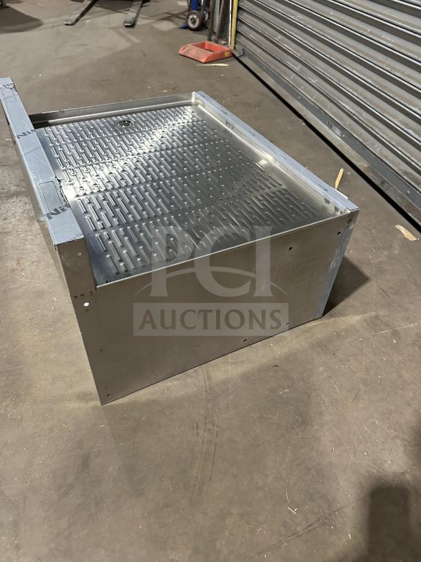 Krowne commercial stainless steel work table with perforated drain board top, model KR24-GS30, brand new condition.