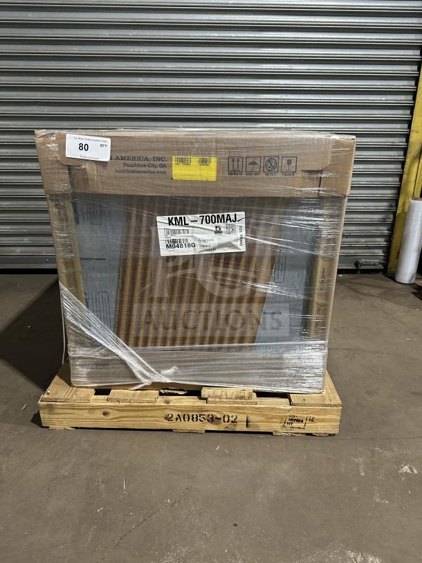 Brand new Hoshizaki KLM-700MAJ commercial ice maker in box, air-cooled, crescent cubes, Energy Star rated, SN: MO4818G.