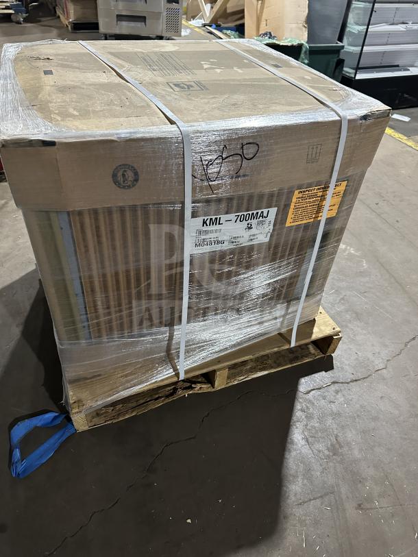 Brand new Hoshizaki KLM-700MAJ stainless steel ice maker, air-cooled, crescent cubes, Energy Star certified, in packaging.