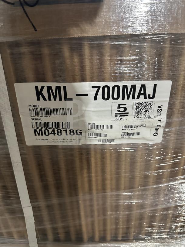Brand new Hoshizaki KLM-700MAJ ice maker packaged. Serial: M04818G. Air-cooled, stainless steel, Energy Star certified.