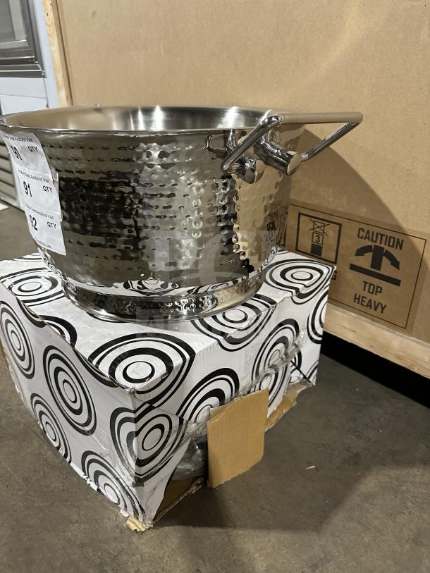 New commercial stainless steel ice bucket/beverage tub with hammered finish, side handles, and protective packaging.