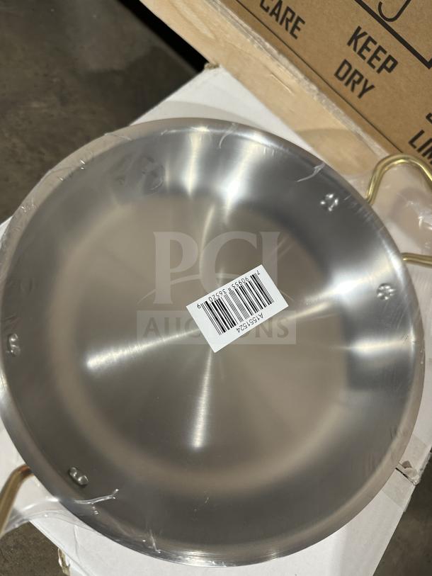 Brand new Paderno Copper Series stainless steel round gratin pan, model A1551524, with barcode label, pristine condition.