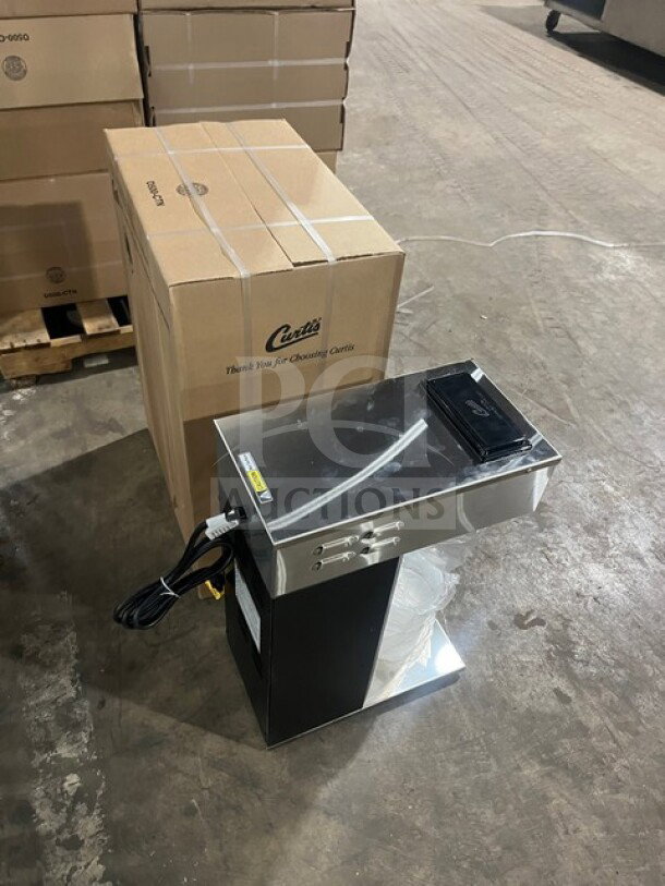 Brand new Curtis countertop coffee brewing machine, model CAFEOAP10A000, 120V, with original box and serial 15160857.