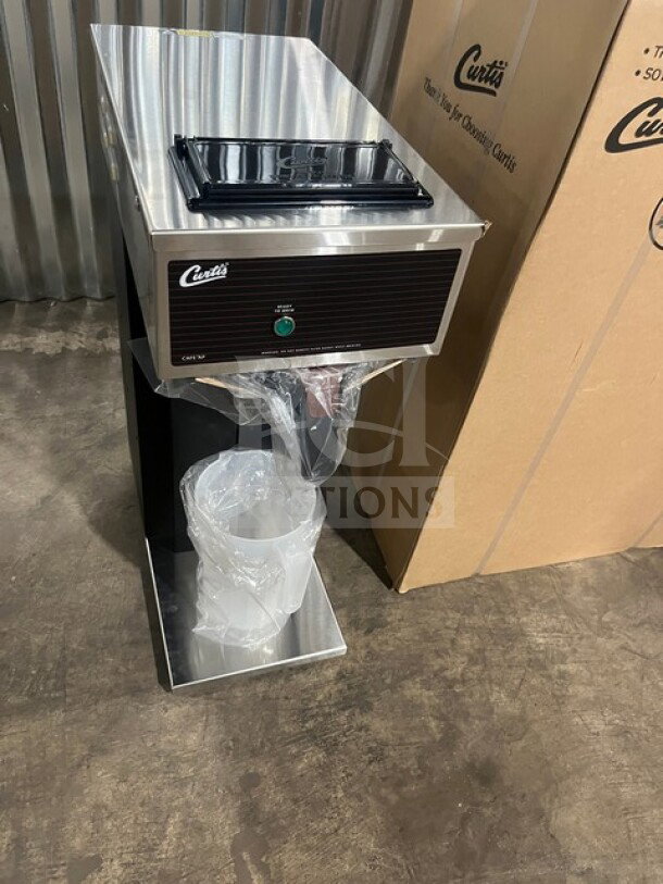 Brand new Curtis countertop coffee brewer, model CAFEOAP10A000, in box. Serial 15160857, 120V, 1 phase.