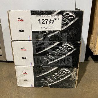 Brand new Staub Round Cocotte Pot Model 1101225 in sealed boxes, stack of three. Auction sign reads "3 X Your Bid!"