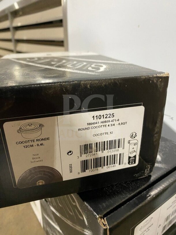 Brand new Staub Round Cocotte Pot, model 1101225, in original box. Black, 12cm, 0.4L capacity.