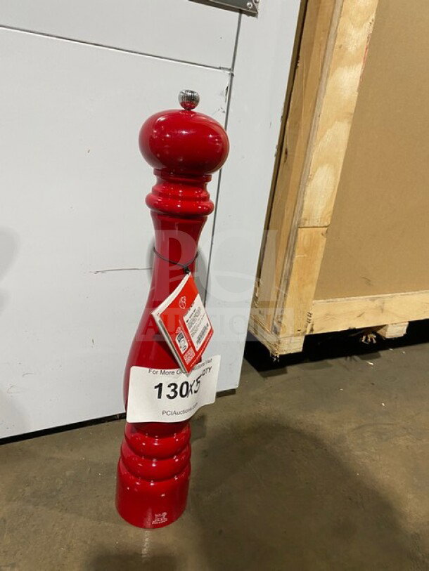 Brand new Peugeot Paris MP40 black pepper crusher, red finish. Features quality craftsmanship and elegant design.