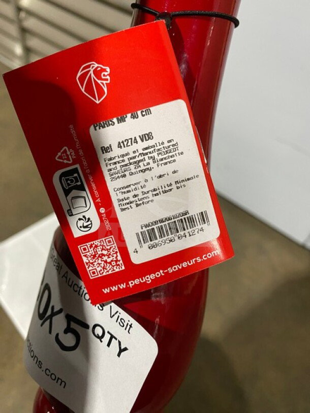 Brand new Peugeot Paris MP40 black pepper crusher with tags. Features high-quality construction, model details, and barcode.