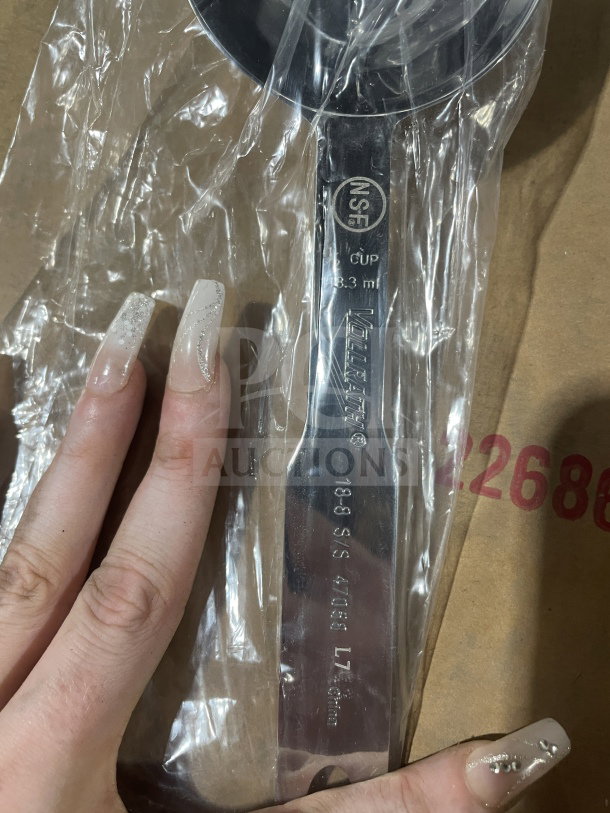 Brand new Vollrath 1/2 cup stainless steel serving spoon, Model 47058, with NSF marking, in clear packaging.