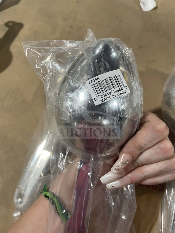 Brand new Vollrath 47058 stainless steel 1/2 cup serving spoon in packaging, label indicates made in China.