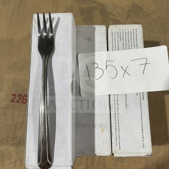 Brand new commercial stainless steel cocktail fork, set of seven, shown in packaging.