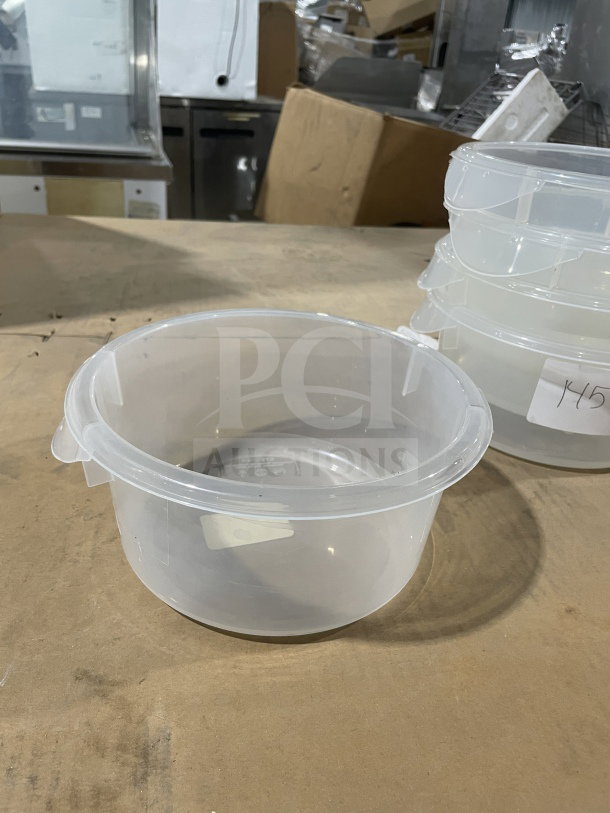 Rubbermaid Commercial polycarbonate food storage container, clear with yellow lids, model FG572024CLR, brand new.