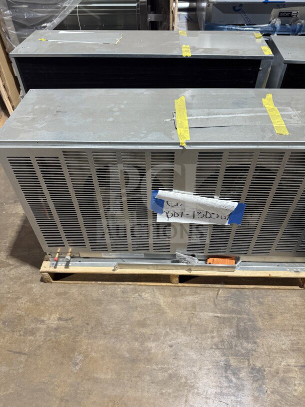 Brand new Hoshizaki URC-22FZ stainless steel condensing unit, 115V, 1 Phase, SN: M01425J, with visible labels and tape.