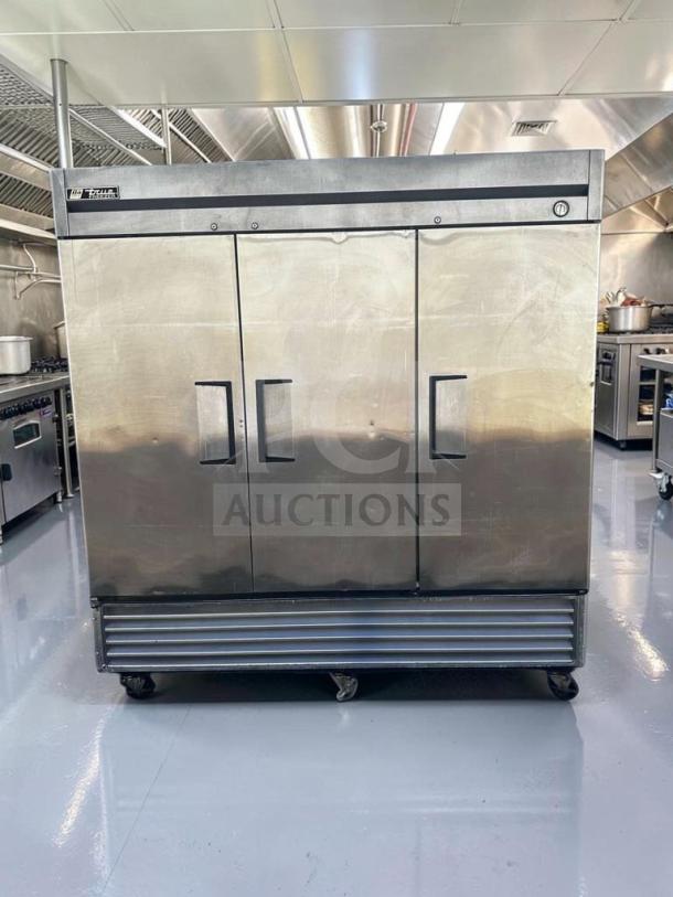 True T-72F, 3-door stainless steel reach-in freezer, 78", immaculate condition, fully tested, by True Manufacturing Co., USA.