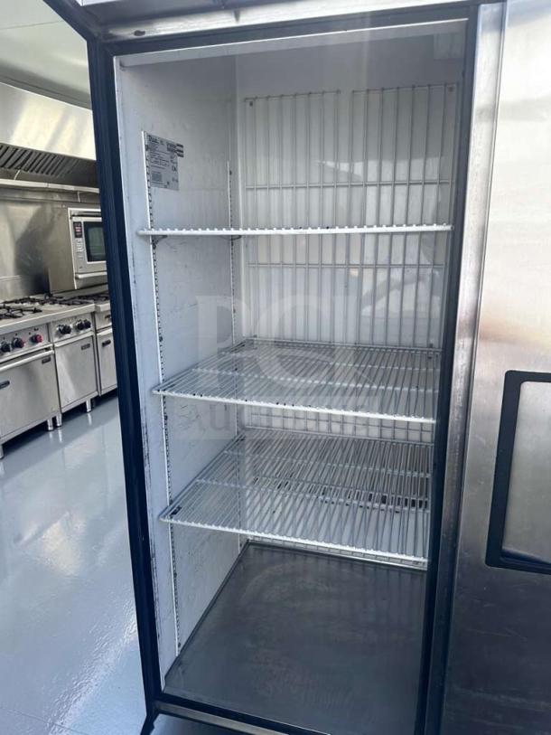 True T-72F commercial reach-in freezer, 3 doors, 78” stainless steel, immaculate condition, fully tested, label inside.