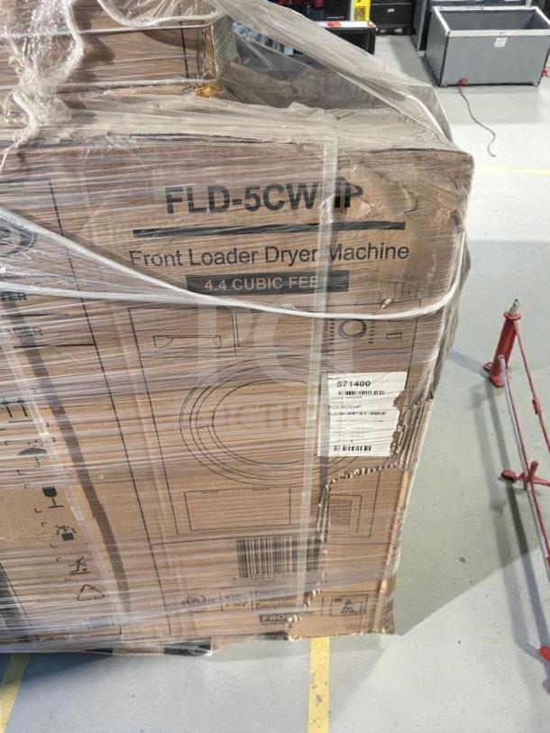 KoolMore FLD-5CWHP ventless front load dryer, 4.4 cu. ft., new with scratch and dent packaging visible.