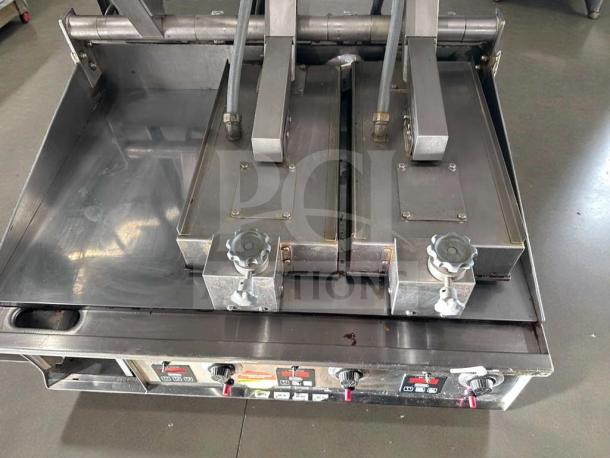 Keating Miraclean® 36" gas griddle in exceptional condition, features UL & NSF listings, stainless steel build, fully operational.