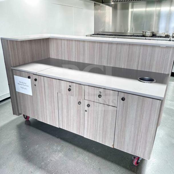 72" commercial restaurant service counter with laminate finish, storage cabinets, trash cutout. Excellent condition.