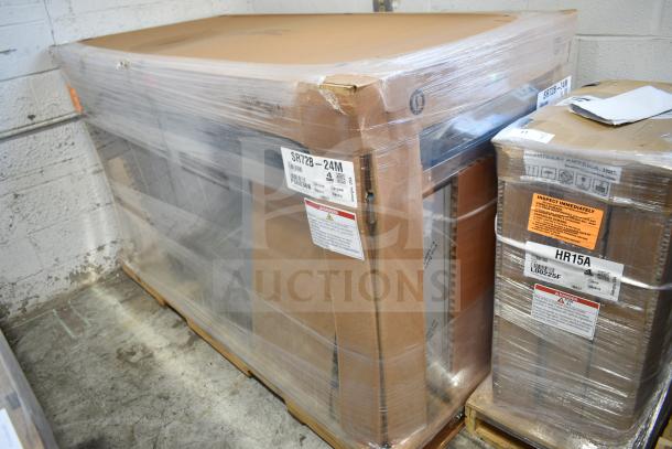 Brand new Hoshizaki SR72B-24M prep table in packaging, labeled as scratch and dent. Includes refrigerated base. Model visible.