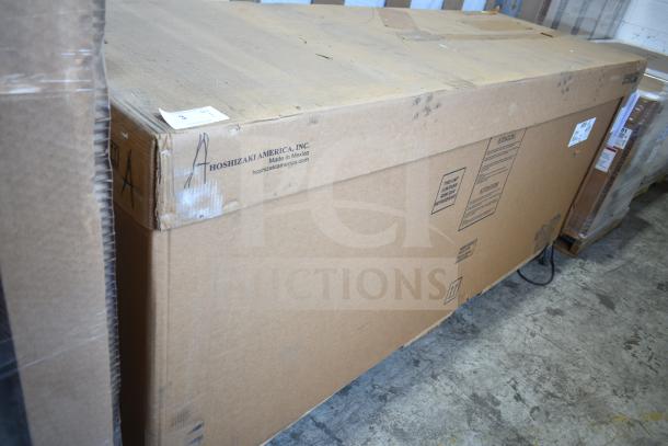 Cardboard box packaging for a 2023 Hoshizaki BB95-G bar refrigerator, 3 glass doors, 115 volts, showing scratches and dents.