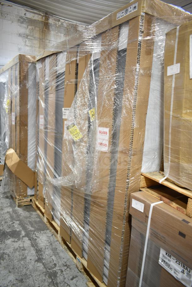Brand new Hoshizaki RM-65-HC-WHT glass door merchandiser, packaged and wrapped, visible "GLASS" warning labels.