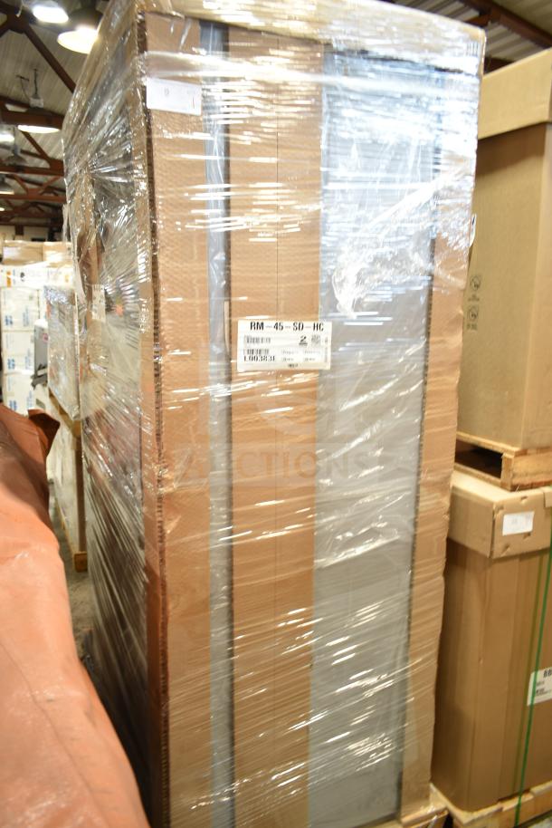 Brand new Hoshizaki RM-45-SD-HC 51" glass door merchandiser with sliding doors, in packaging, marked for scratches.