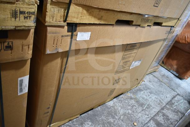 Brand new 2021 Hoshizaki HBB-3-69 refrigerator in shipping box. Scratch and dent condition, 115V, 1 phase, tags visible.