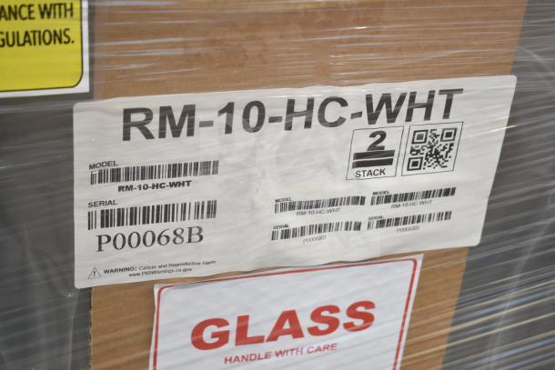 "BRAND NEW SCRATCH AND DENT! 2024 Hoshizaki RM-10-HC-WHT glass door merchandiser packaging with model label and handling warning."