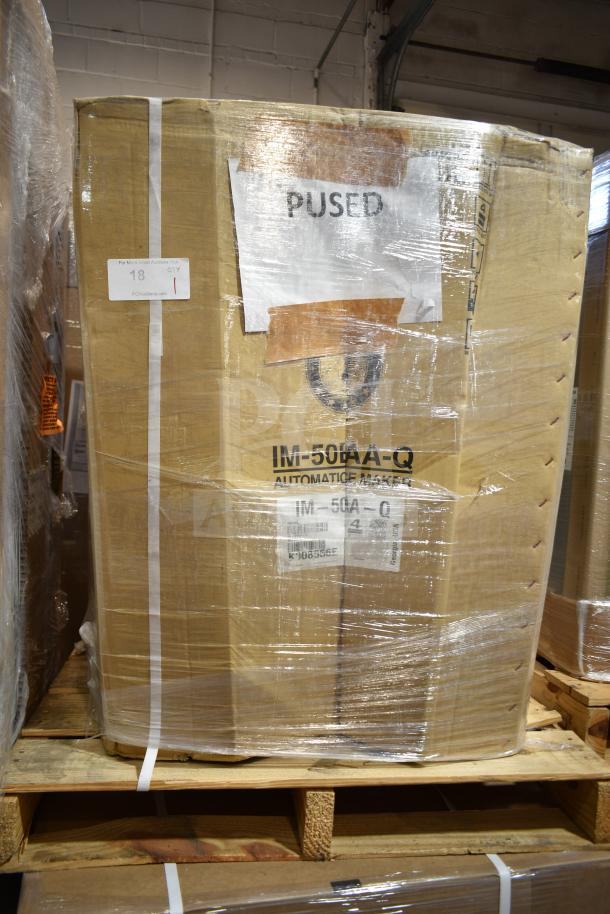 Boxed Hoshizaki IM-50BAA-Q ice sphere machine on pallet, labeled "PUSED." Brand new, scratch and dent model, 50 lbs/day capacity.