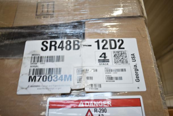 Brand new Hoshizaki SR48B-12D2 48" prep table packaging, labeled with model, serial number M70034M, and safety warnings.