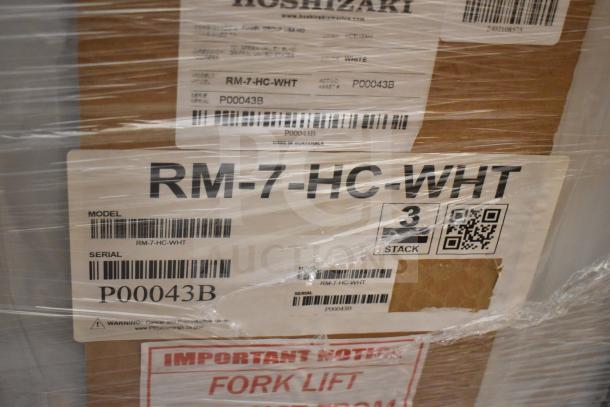 Brand new 2024 Hoshizaki RM-7-HC-WHT countertop refrigerator in packaging, featuring model and serial labels.