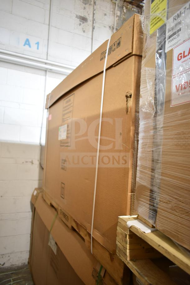 Brand new Hoshizaki HDD-2-59-S refrigerator in packaging, two-section, stainless steel, 115 volts, with minor package damage.