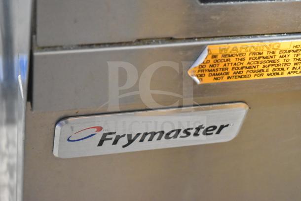 2016 Frymaster FBCR18CSE rethermalizer, natural gas, floor style, 90,000 BTU, visible warning label detailing usage precautions.