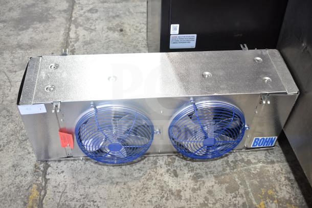 Bohn BEL0650AG6AMAD2107 commercial evaporator fan, 115V, 1 phase, dual blue grille, stainless finish, new condition.