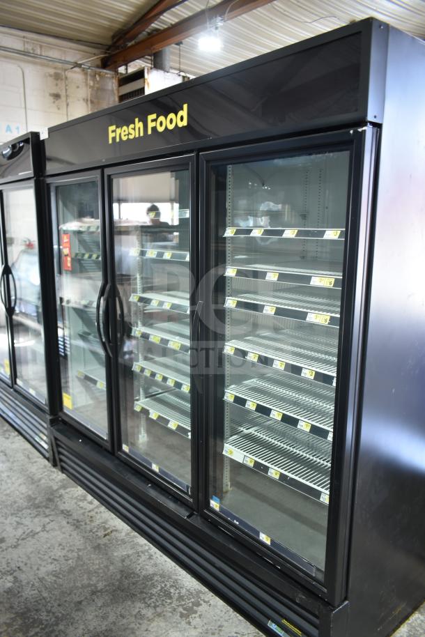 2021 True GDM-72-HC commercial 3-door cooler merchandiser, 115 volts, 1 phase, "Fresh Food" sign, excellent condition.