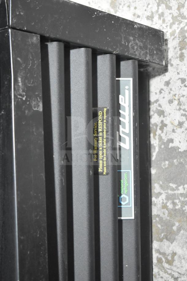 2021 True GDM-72-HC Commercial Cooler, 3-door, tested and working. Visible labels indicate warranty and refrigerant use.