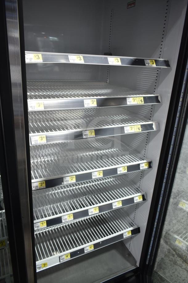 2021 True GDM-72-HC commercial 3-door cooler, 115 volts, 1 phase, includes shelves with price tags, tested and working.