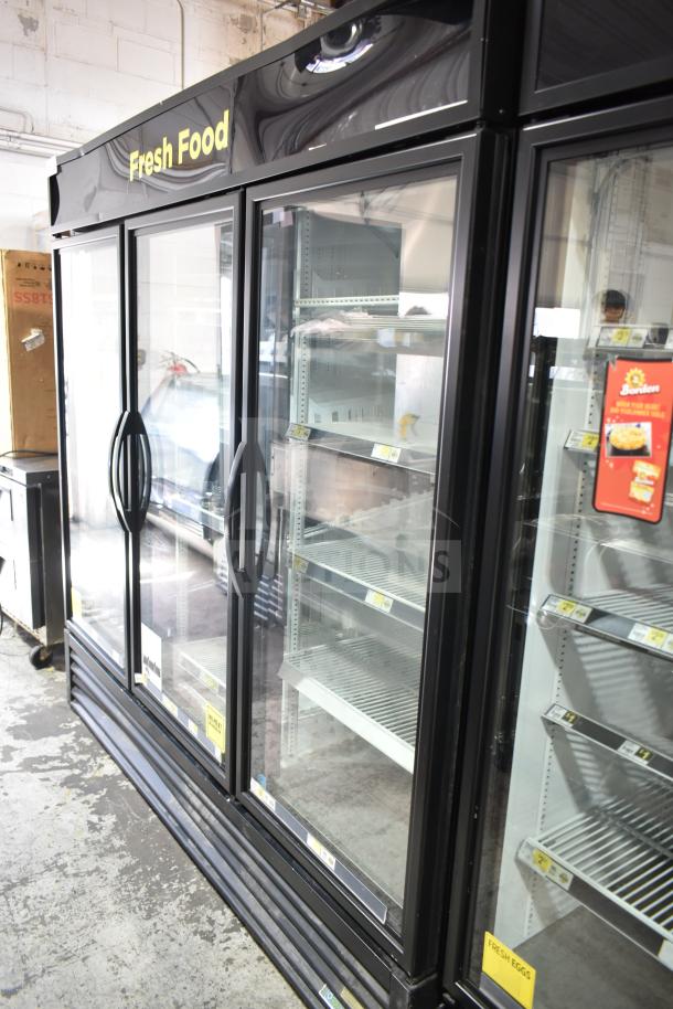 2020 True GDM-72-HC 3 Door Reach-In Cooler Merchandiser, tested and working, features glass doors, 115V, 1 phase.