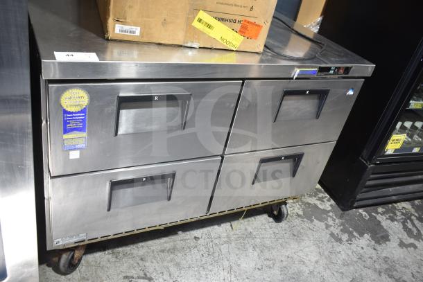 Everest ETBR2-D4 Commercial 4 Drawer Undercounter Cooler with casters, label indicating best warranty, 115V, 1 phase.