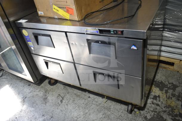 Everest ETBR2-D4 commercial 4-drawer undercounter cooler on casters, 115 volts, 1 phase. Stainless steel, good condition.